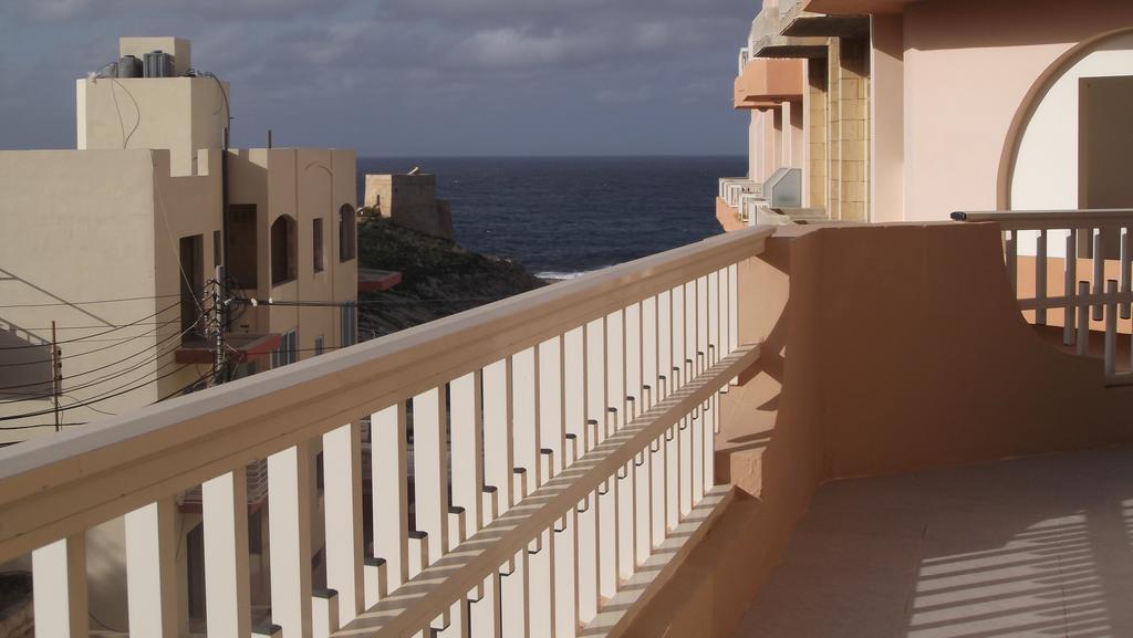 Apartamento Hideaway Flats Xlendi Habitación foto