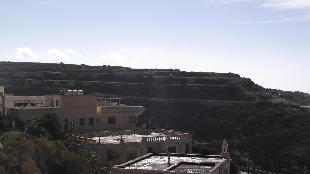 Apartamento Hideaway Flats Xlendi Habitación foto